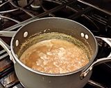 A picture of step 6 of Toasted Coconut Caramel Cashew Bars.