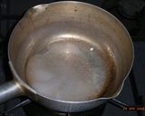 A picture of step 1 of Easy Caramel Sauce for Custard Flans.
