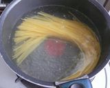 A picture of step 1 of Pasta with Bacon, Shimeji Mushrooms and Cream Sauce.