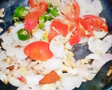 A picture of step 1 of Matar paneer curry.