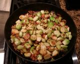 A picture of step 5 of Pan Fried Brussel Sprouts with Blood Orange and Applewood Bacon.