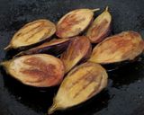 A picture of step 4 of Baingan Posto.