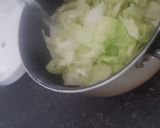 A picture of step 2 of Homemade,non mayonasse coleslaw! (in baguette).