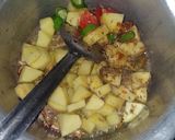 A picture of step 2 of Aloo saim phali.
