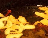 A picture of step 3 of Make Your Own Red Chili and Garlic Oil.