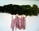 A picture of step 1 of Butter-Sautéed Spinach.