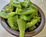 A picture of step 4 of Pilaf (Biriyani) with green veggies.