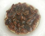 A picture of step 1 of Bread Machine Baked White Wine Bread with Walnuts and Raisins.