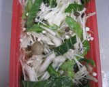 A picture of step 1 of Easy Microwave-Steamed Salmon and Mushrooms in a Silicone Steamer.