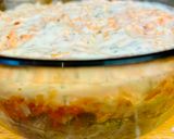A picture of step 3 of Hake in the oven under a cheese crust.