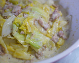 A picture of step 6 of Simmered Spring Cabbage and Spring Onions with Mustard Cream.