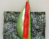 A picture of step 5 of Inside-Out Uramaki California Rolls.