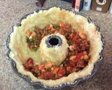 A picture of step 3 of Sartu Di Riso.