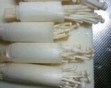 A picture of step 2 of Enoki Mushrooms Wrapped with Sliced Pork Belly.