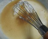 A picture of step 13 of Easy Rich Cream Stew in a Le Creuset Pot.