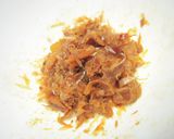 A picture of step 1 of Rice Balls with Umeboshi and Bonito Flakes.