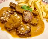 A picture of step 13 of Pork Tenderloin in Sauce.