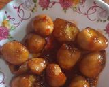 Hình bước làm 4 của món Trứng cút rim bơ tỏi