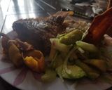 Foto del paso 5 de la receta Mojarra frita, ensalada, arroz y chips de plátano