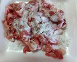 A picture of step 1 of Teriyaki Taro Roots and Pork.