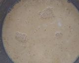 A picture of step 7 of Punjabi kadhi with baked pakoras.