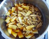 A picture of step 5 of King Trumpet & Shimeji Mushrooms Simmered in Sweet Soy Sauce.