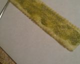 A picture of step 6 of Pesto Turkey Florentine Lasagna Roll Ups.