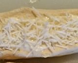 A picture of step 6 of Tinklee's Garlic Parmesan Cheese Rolls.
