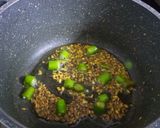 A picture of step 1 of Achaari Kela.