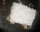 A picture of step 1 of Saucy Sausage noodles.