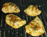 A picture of step 5 of Spicy Peach Glazed Chicken.