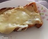 A picture of step 2 of Egg In A Hole Sandwich.