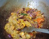 A picture of step 2 of Baingan bartha stuffed bread.