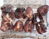 A picture of step 2 of Dates Wrapped in Bacon.