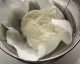 A picture of step 1 of Fruit-Packed Yogurt Ice Cream Cake.