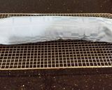 A picture of step 13 of Chocolate Strawberry Cream Cake Roll.