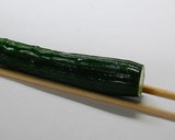 A picture of step 1 of Accordion Cucumbers.