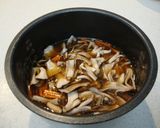 A picture of step 4 of Rice with Maitake Mushrooms Seasoned with Simmered Pork Belly Sauce.