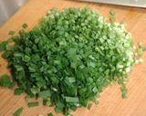 A picture of step 2 of Crispy Gyoza Dumplings with Bean Sprouts and Garlic Chives.
