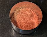 A picture of step 1 of Masoor Dal Bharta Bengali style.