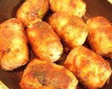 A picture of step 8 of "Samurai Warrior" Shiso and Meat Wrapped Onigiri.