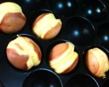 A picture of step 4 of Baby Castella Using a Takoyaki Maker.