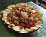 Une image de l'étape 12 de Salade de pommes de terre aux tomates, poivrons, artichauts et olives.