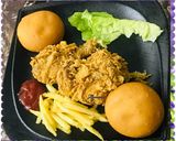 A picture of step 2 of Kfc style chicken with French fries.