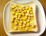 A picture of step 2 of For Breakfast: Curry, Mayonnaise and Corn on Toast.