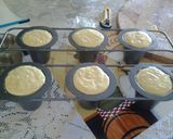 A picture of step 4 of Lemon filled butterfly cupcake.
