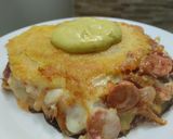 Foto del paso 8 de la receta: Arepa rellena de salchicha, pimentón, cebolla y queso🥯🌭🧀