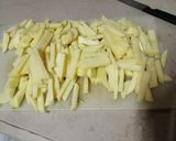 A picture of step 1 of Masala Fries with mayo dip.