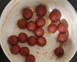 A picture of step 8 of Papaya ladu.