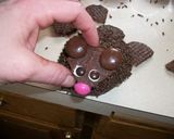 A picture of step 11 of Mouse Invasion Cupcakes.